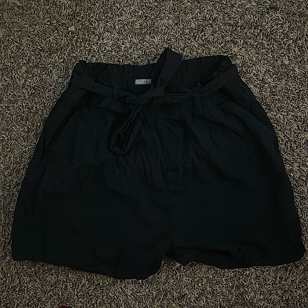 Large, black, Falls Creek shorts.  With tie belt and front pockets